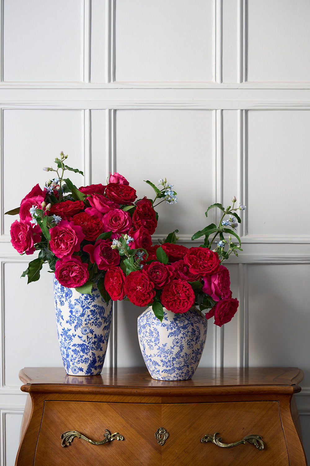Berry Reds Rose Bouquet in Blue Ceramic Vases