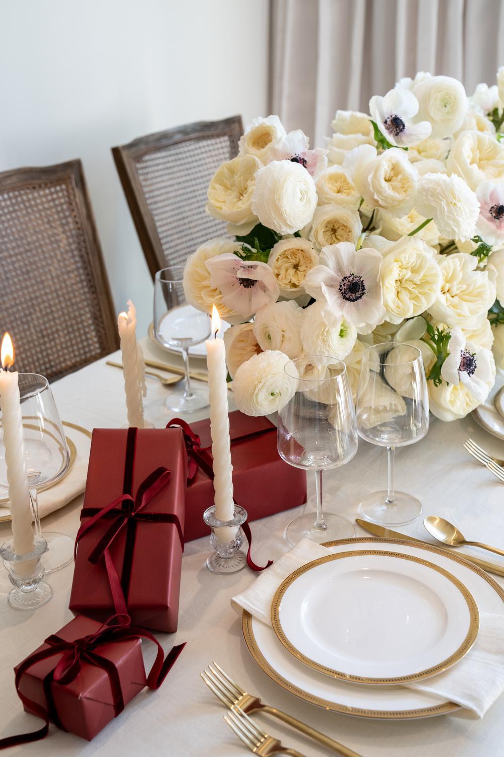 White rose Christmas floral table arrangement