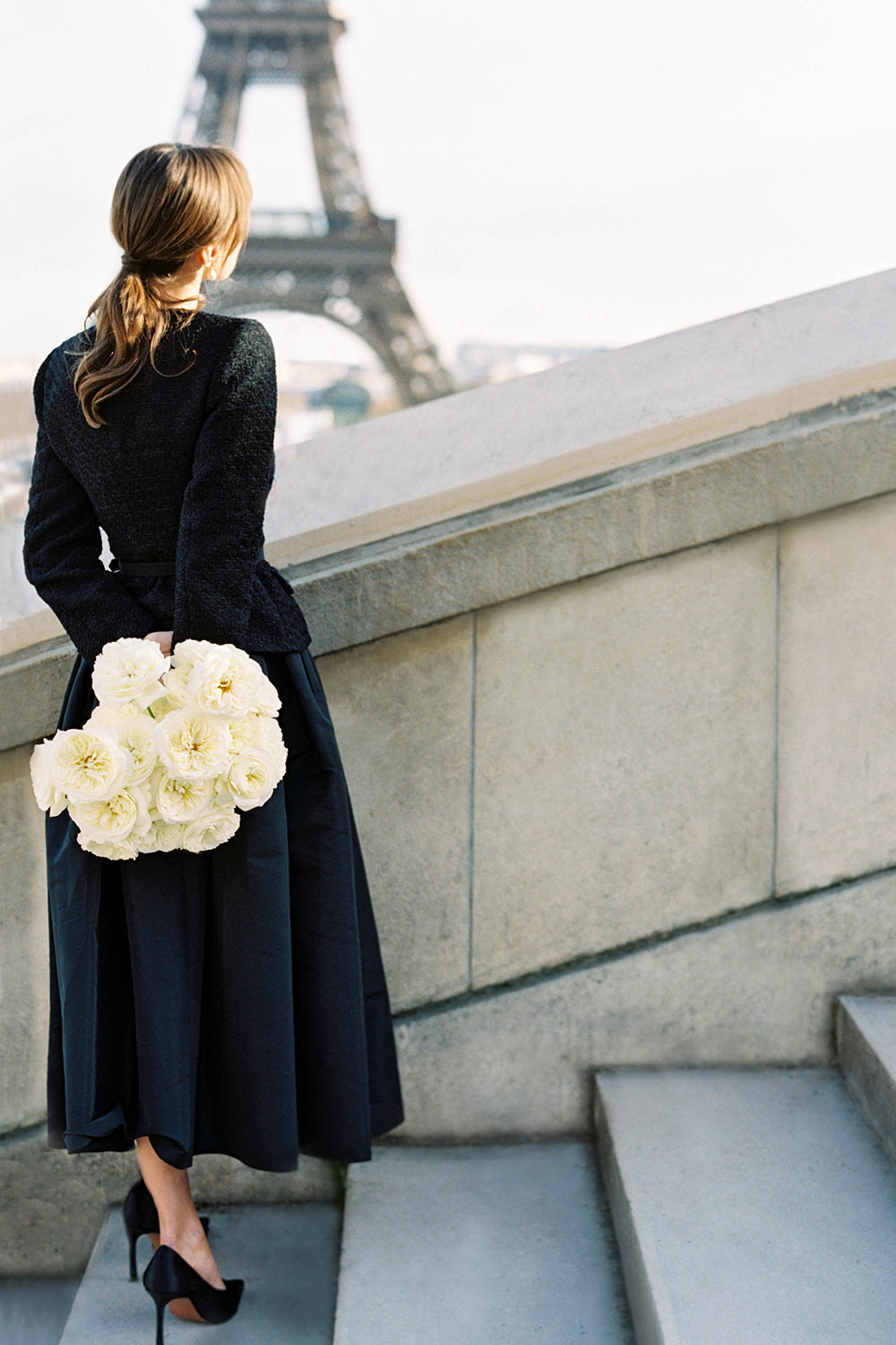 Leonora Rose Muse Holding Bouquet by The Eiffel Tower Paris