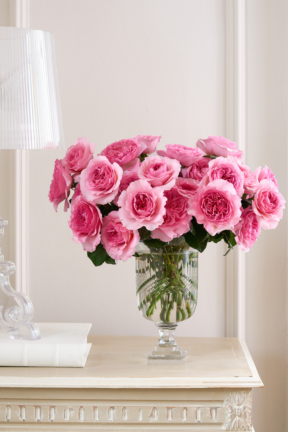 Millicent Rose 32 Stems in Vase sat on Table