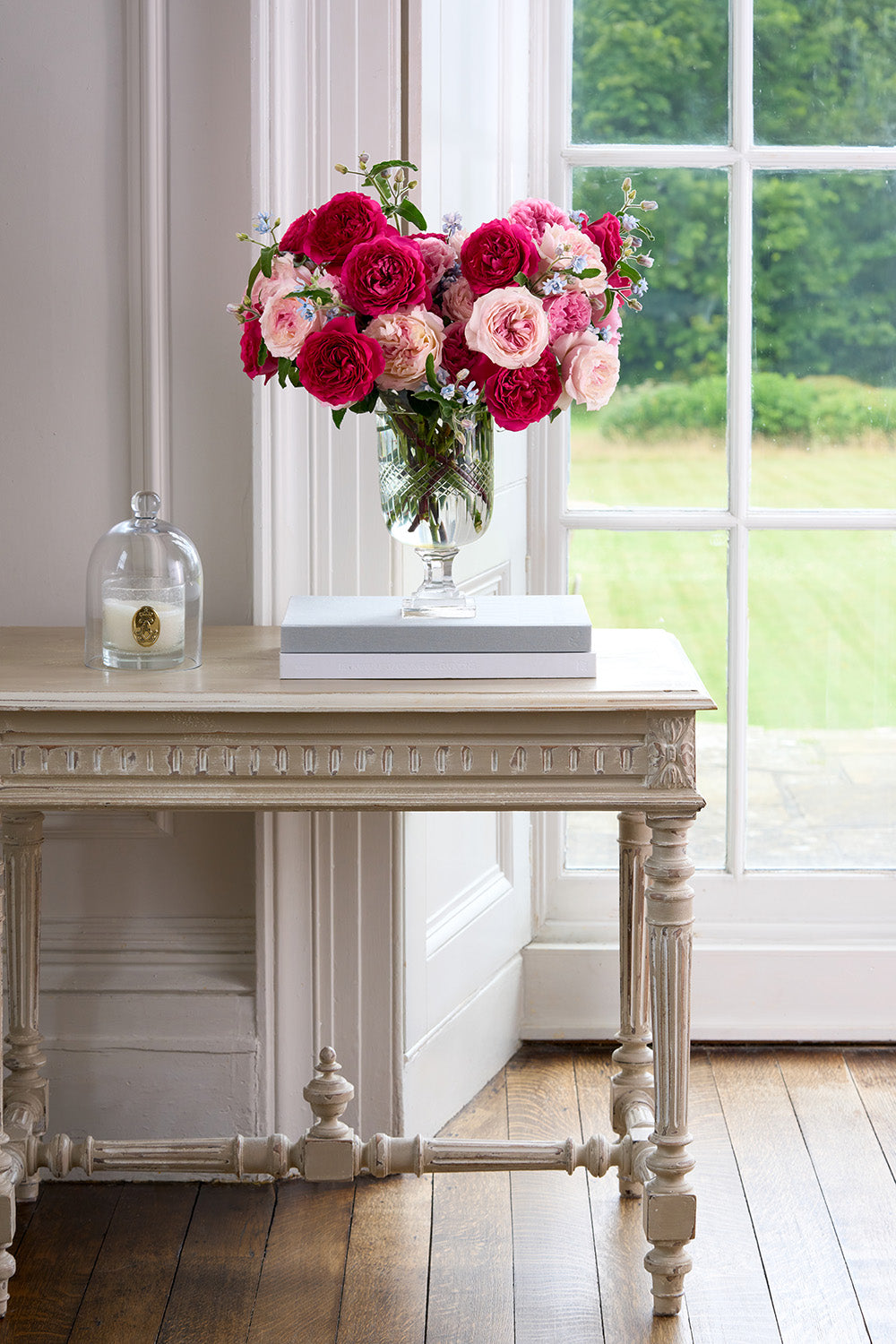 Purely Pink Rose Bouquet Arrangement in Vase Sat on Books